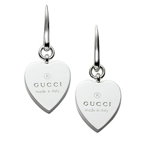 gucci silver heart dangle earrings|gucci trademark heart earrings.